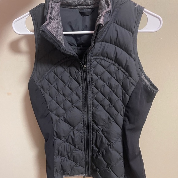 Jackets & Blazers - Black Lululemon Puffer Vest with High Collar and Fitted Silhouette